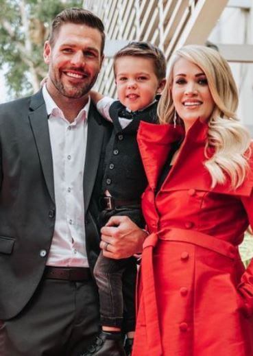 Carrie with her husband and son